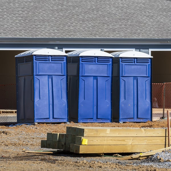 what is the cost difference between standard and deluxe porta potty rentals in Farmersville